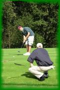cg054Daniel putts.jpg 175.1K